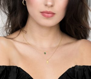 emerald necklace with gold layered chain