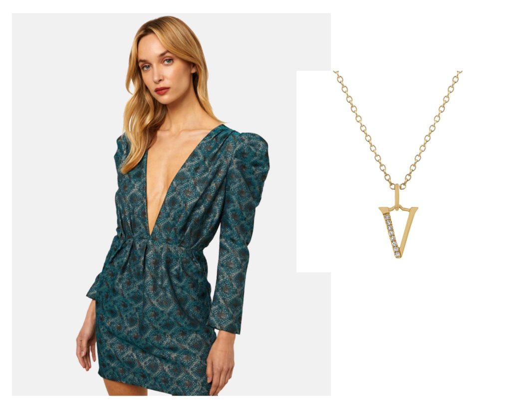 Green plunging v-neck dress with gold pendant necklace