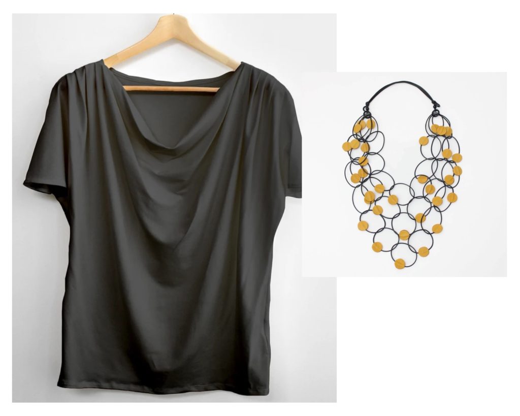 black cowl-neck top with gold necklace