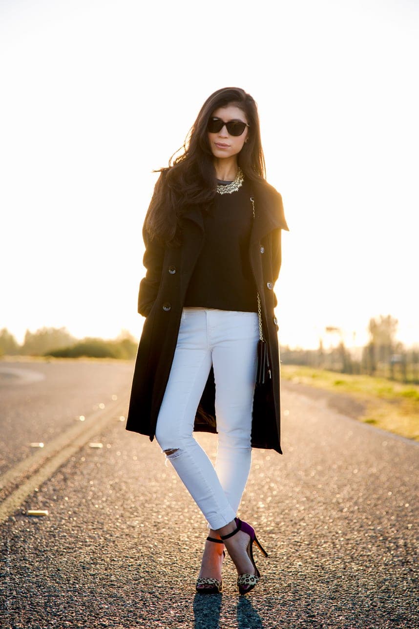 Black outfit with jeans and cheetah heels