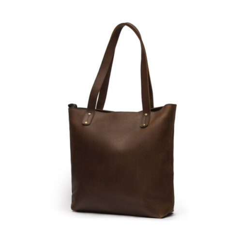 A brown leather tote bag with two shoulder straps against a white background.